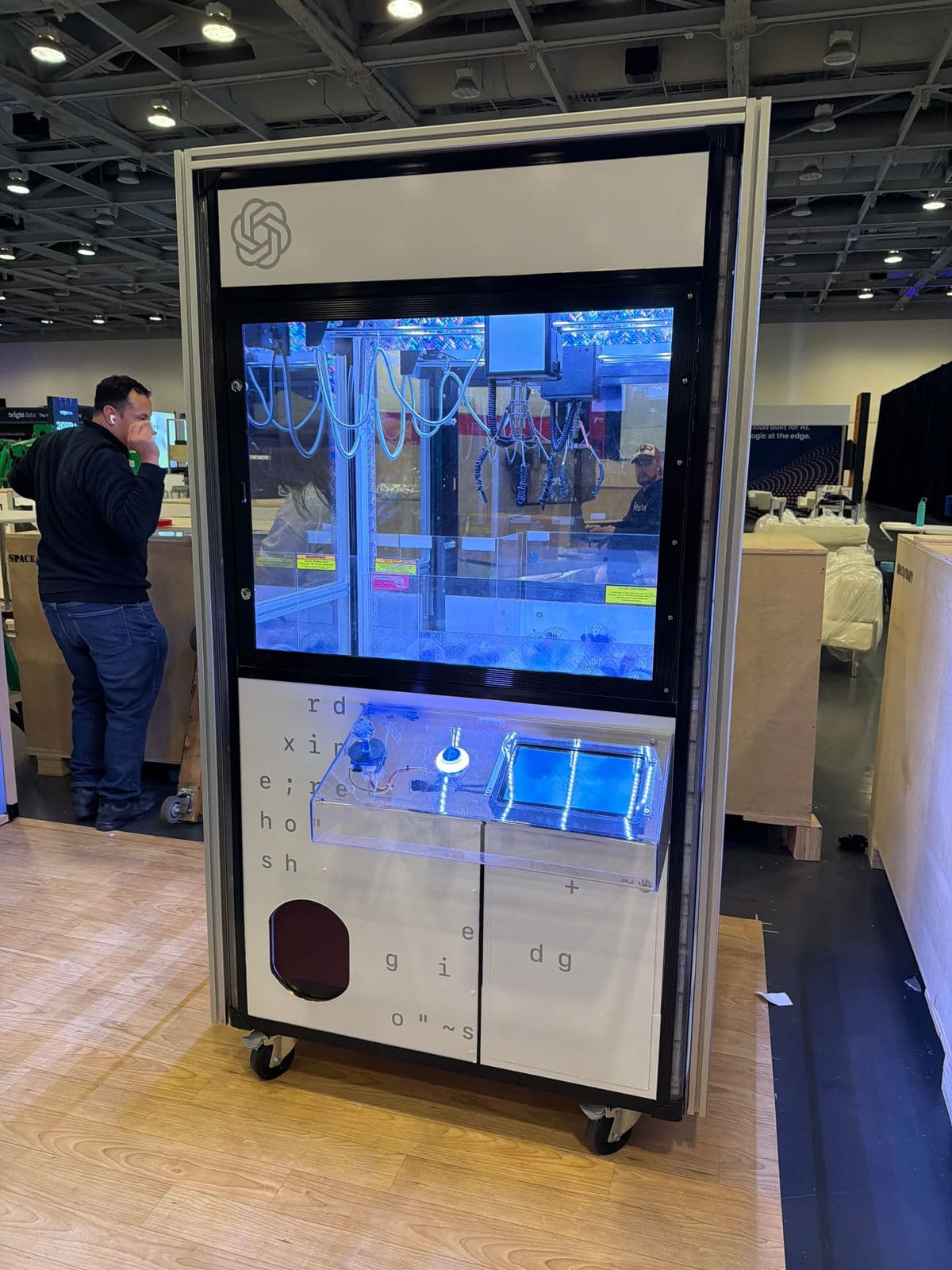 Branded claw machine arriving at Moscone Center for OpenAI's conference activation